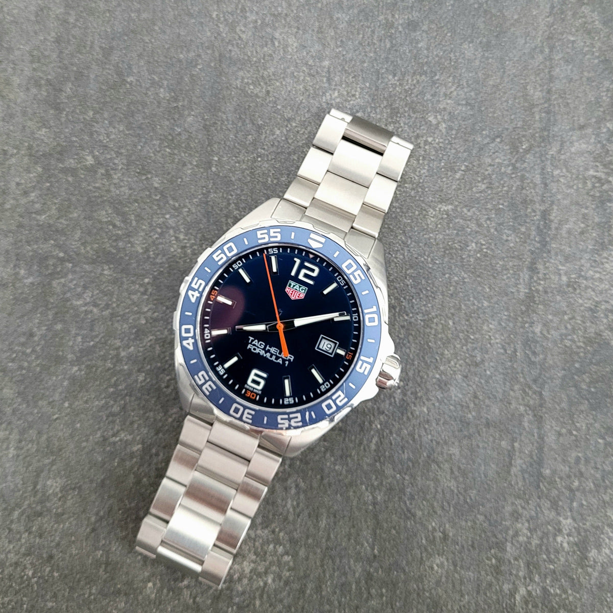 Shop Authentic Tag Heuer Formula 1 Quartz Blue Dial Silver Steel Strap Watch for Men - WAZ1010.BA0842 - Luxxuri