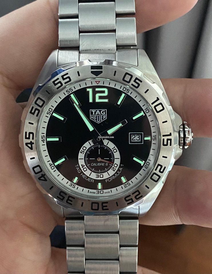 Shop Authentic Tag Heuer Formula 1 Automatic Black Dial Silver Steel Strap Watch for Men - WAZ2012.BA0842 - Luxxuri