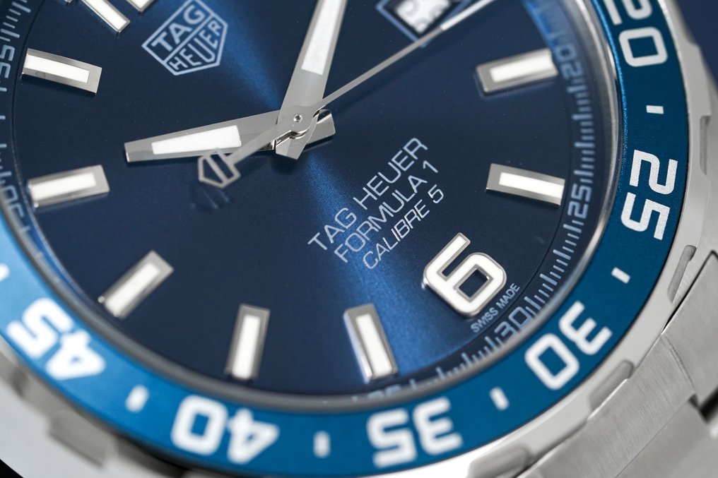Shop Authentic Tag Heuer Formula 1 Bucherer Blue Edition Blue Dial Silver Steel Strap Watch for Men - WAZ2015.BA0842 - Luxxuri