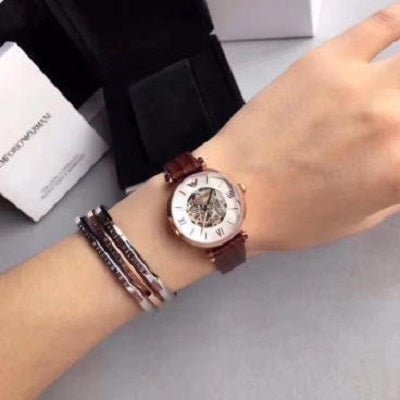 Shop Authentic Emporio Armani Meccanico Skeleton Mother of Pearl Dial Brown Leather Strap Watch For Women - AR1993 - Luxxuri