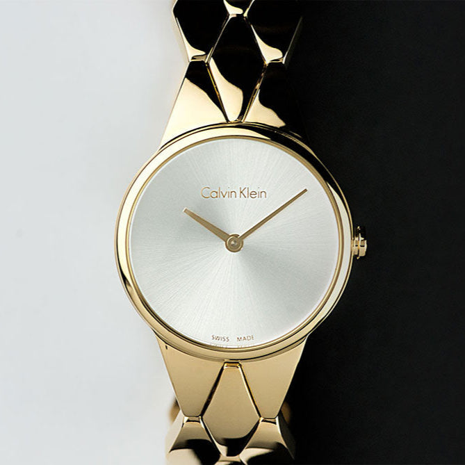 Shop Authentic Calvin Klein Snake Silver Dial Yellow Gold Steel Strap Watch For Women - K6E23546 - Luxxuri