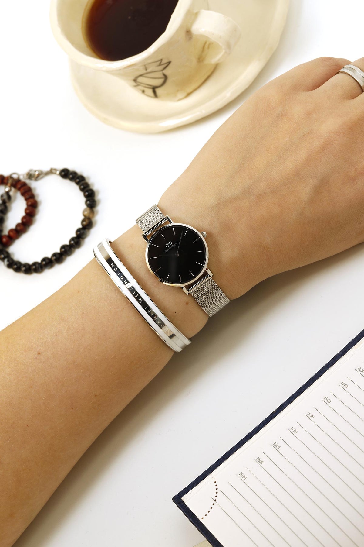 Shop Authentic Daniel Wellington Petite Sterling Black Dial Silver Mesh Bracelet Watch For Women - DW00100218 - Luxxuri
