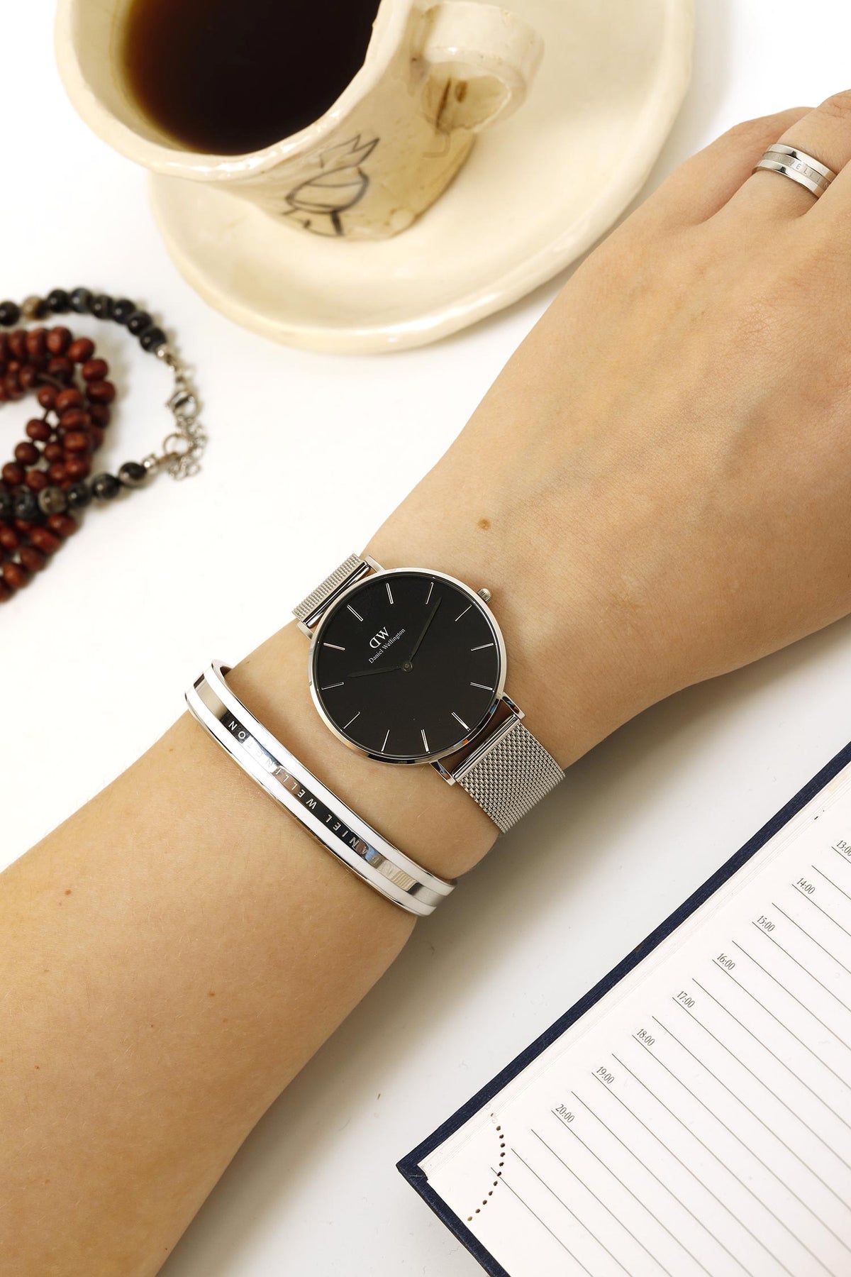 Shop Authentic Daniel Wellington Petite Sterling Black Dial Silver Mesh Bracelet Watch For Women - DW00100304 - Luxxuri