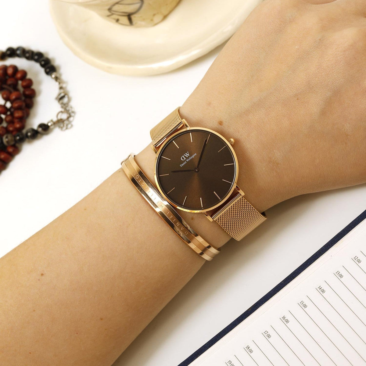 Shop Authentic Daniel Wellington Petite Amber Brown Dial Rose Gold Mesh Strap Watch for Women - DW00100478 - Luxxuri