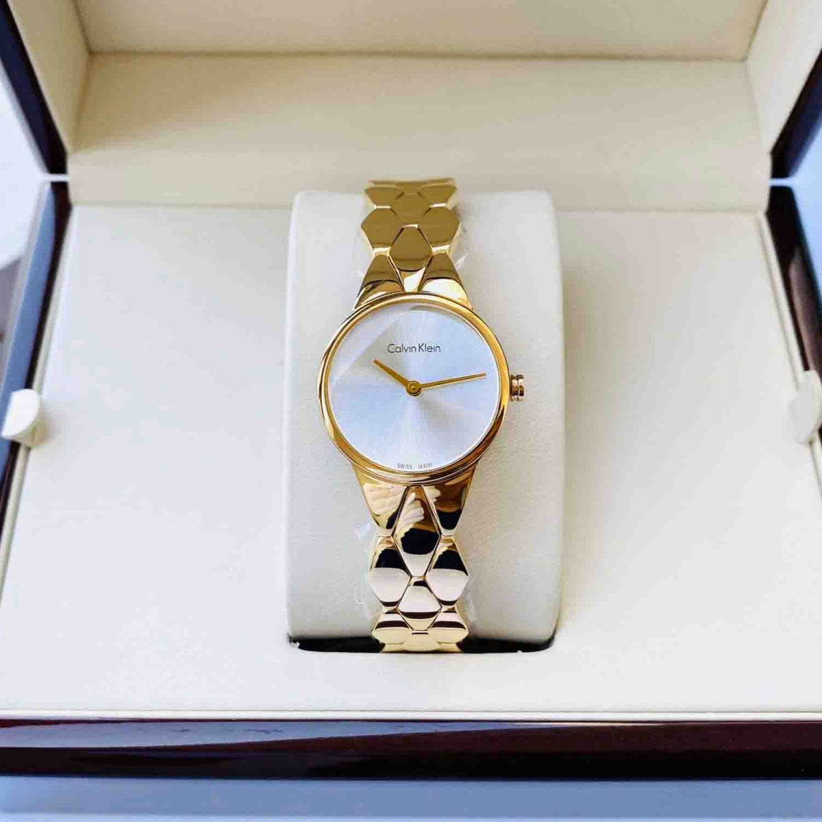 Shop Authentic Calvin Klein Snake Silver Dial Yellow Gold Steel Strap Watch For Women - K6E23546 - Luxxuri