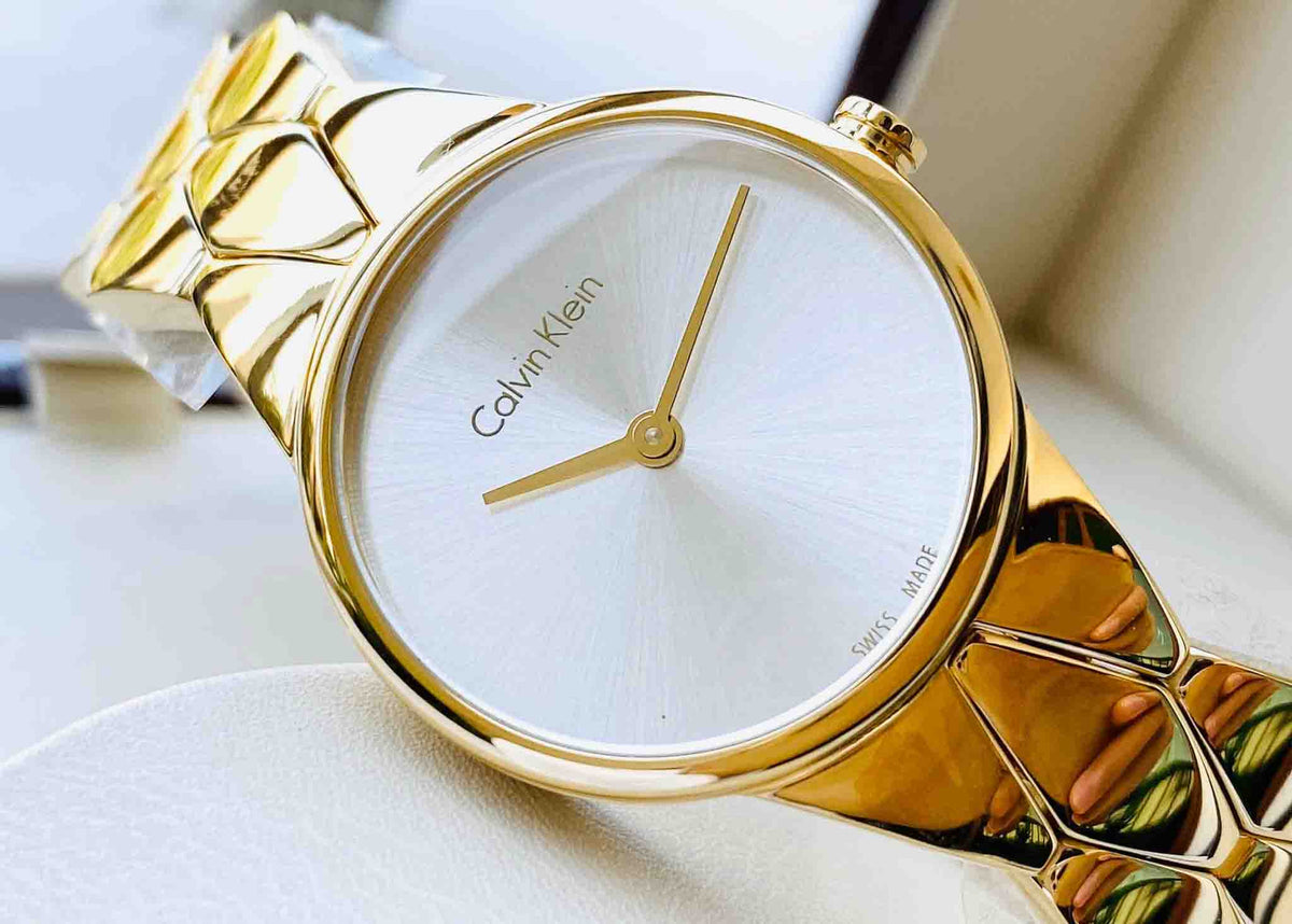 Shop Authentic Calvin Klein Snake Silver Dial Yellow Gold Steel Strap Watch For Women - K6E23546 - Luxxuri
