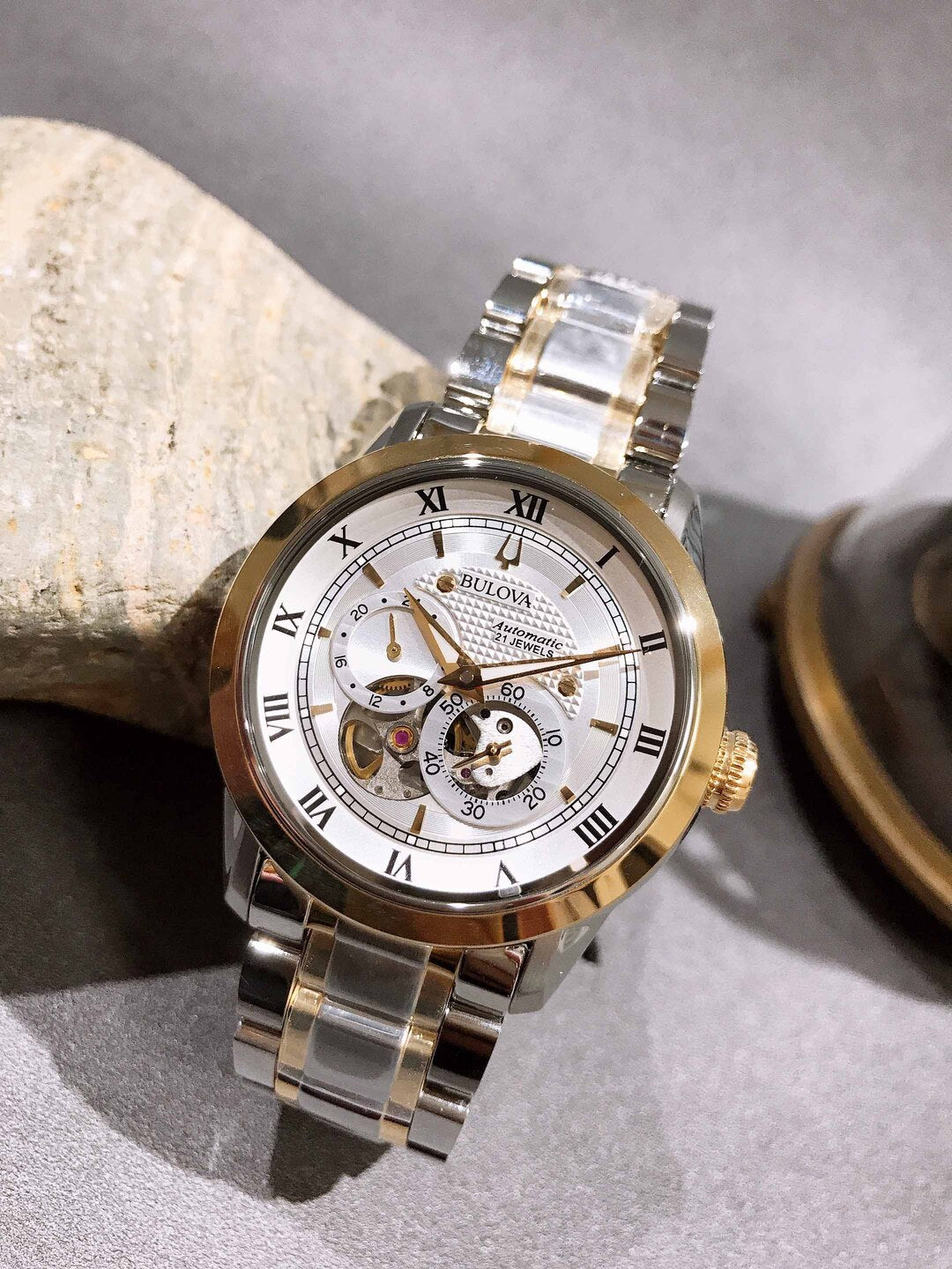 Shop Authentic Bulova BVA Skeleton Silver Dial Two Tone Steel Strap Watch for Men - 98A230 - Luxxuri