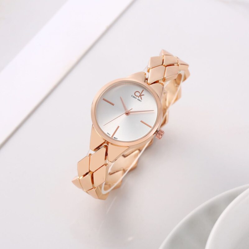 Shop Authentic Calvin Klein Snake Silver Dial Rose Gold Steel Strap Watch For Women - K6E23646 - Luxxuri