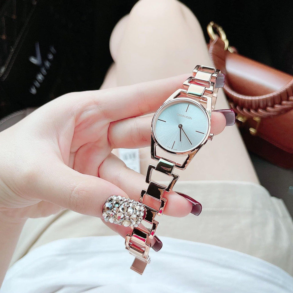 Shop Authentic Calvin Klein Snake Silver Dial Rose Gold Steel Strap Watch For Women - K6E23646 - Luxxuri