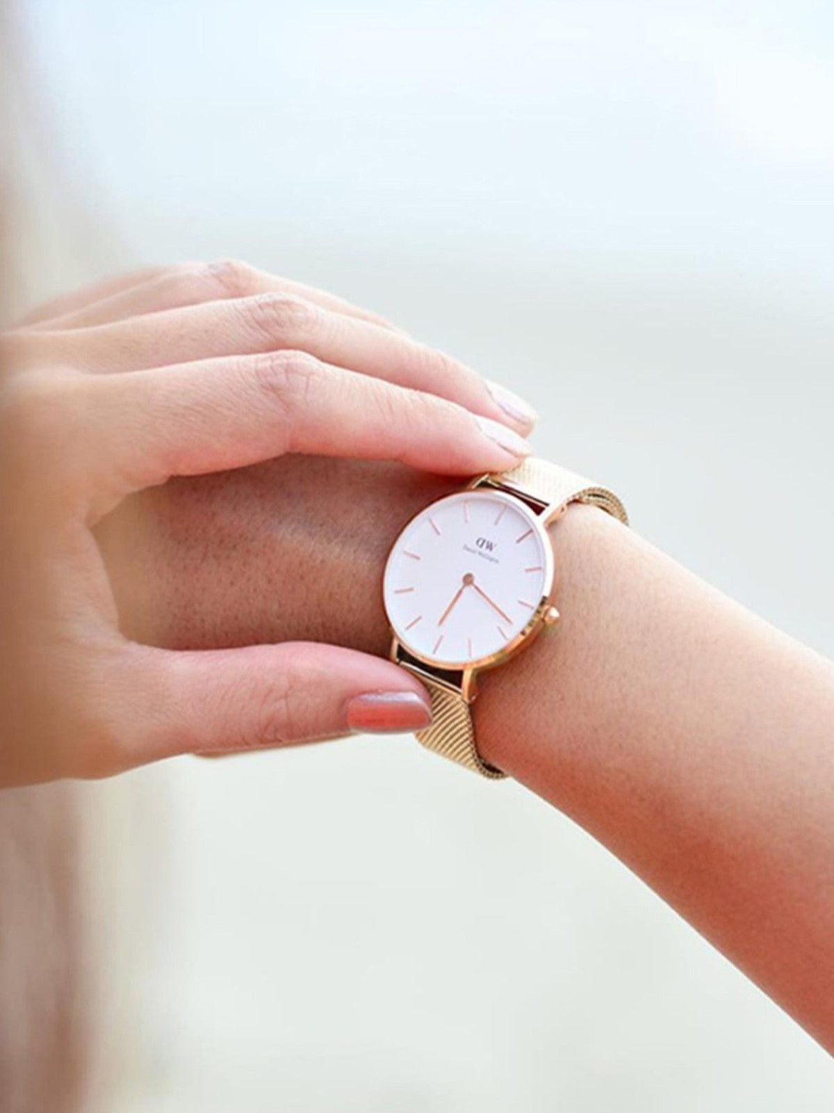 Shop Authentic Daniel Wellington Classic Petite Melrose White Dial Rose Gold Mesh Bracelet Watch For Women - DW00100163 - Luxxuri