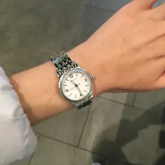 Shop Authentic Burberry Utilitarian White Dial Silver Steel Strap Watch for Women - BU7856 - Luxxuri