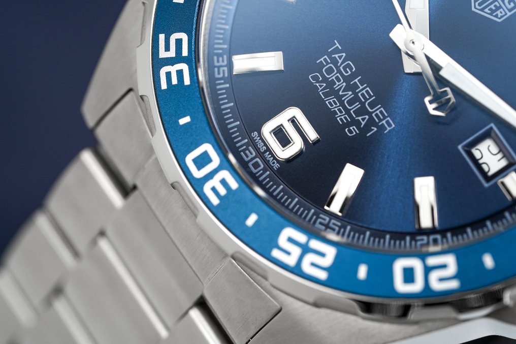 Shop Authentic Tag Heuer Formula 1 Bucherer Blue Edition Blue Dial Silver Steel Strap Watch for Men - WAZ2015.BA0842 - Luxxuri