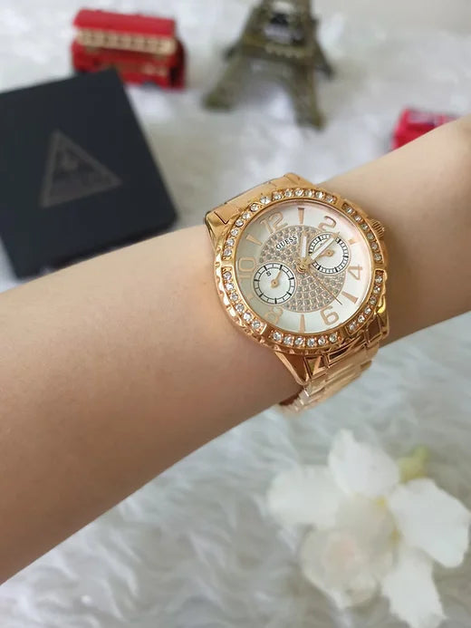 Shop Authentic Guess Sassy Quartz White Dial Rose Gold Steel Strap Watch For Women - W0705L3 - Luxxuri