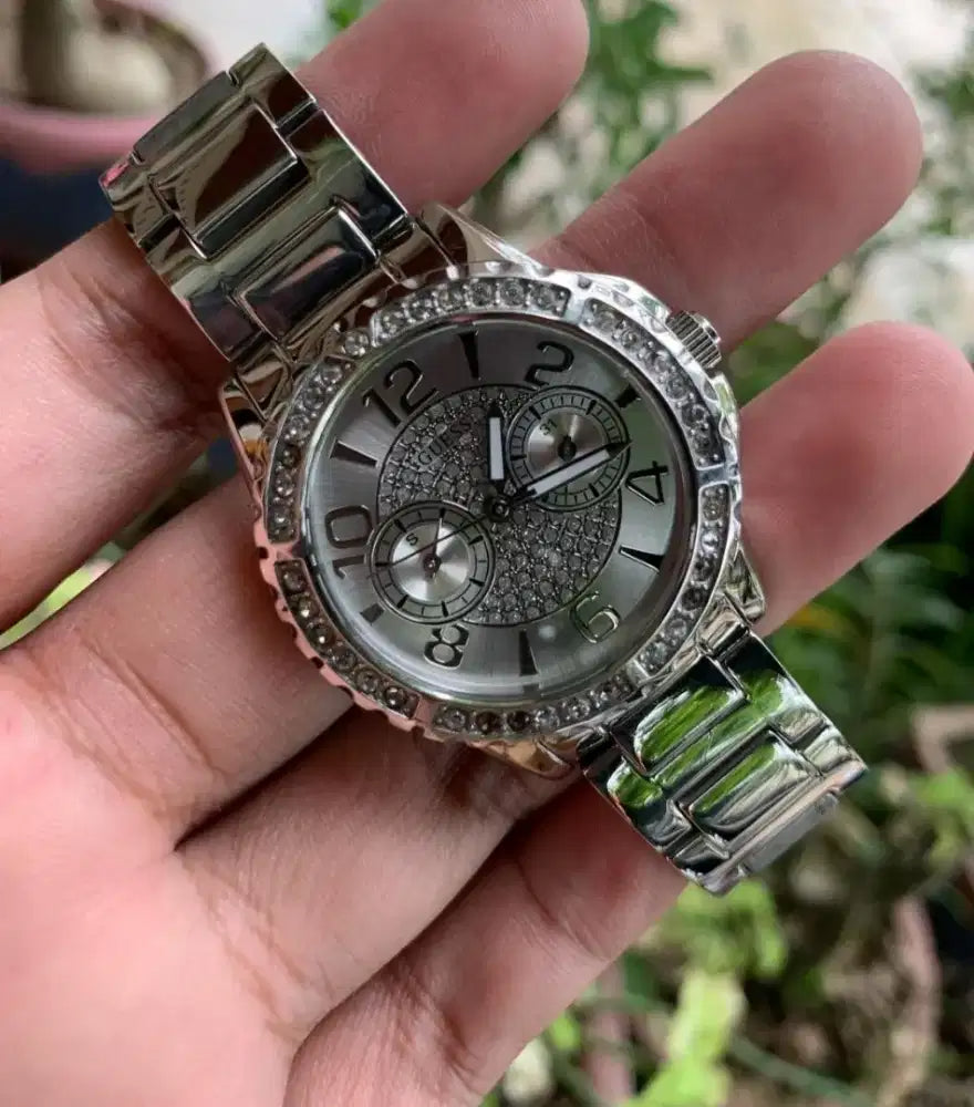 Shop Authentic Guess Sassy Multifunction Quartz Silver Dial Silver Steel Strap Watch For Women - W0705L1 - Luxxuri