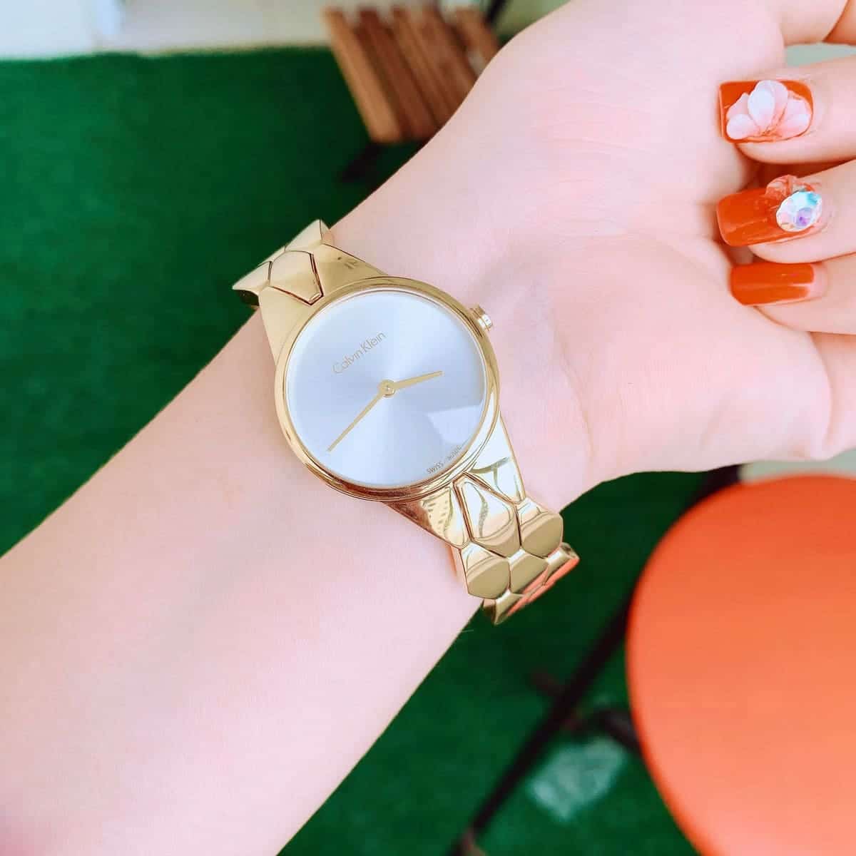 Shop Authentic Calvin Klein Snake Silver Dial Yellow Gold Steel Strap Watch For Women - K6E23546 - Luxxuri