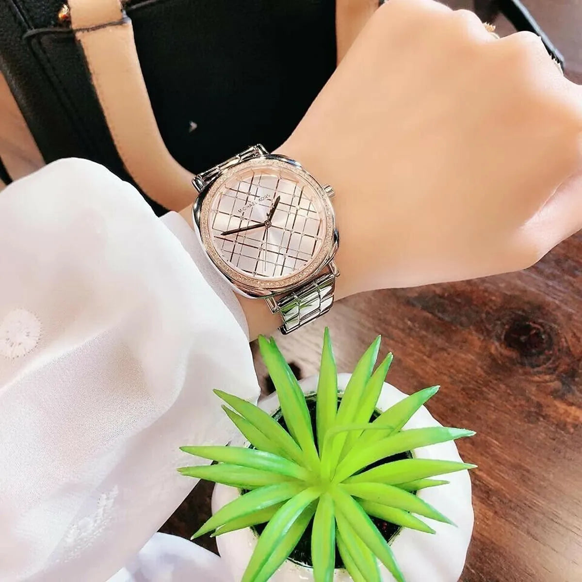 Shop Authentic Michael Kors Nia Quartz Silver Dial Silver Steel Strap Watch For Women - MK3988 - Luxxuri
