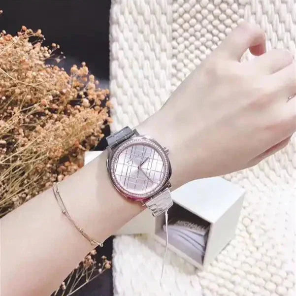 Shop Authentic Michael Kors Nia Quartz Silver Dial Silver Steel Strap Watch For Women - MK3988 - Luxxuri
