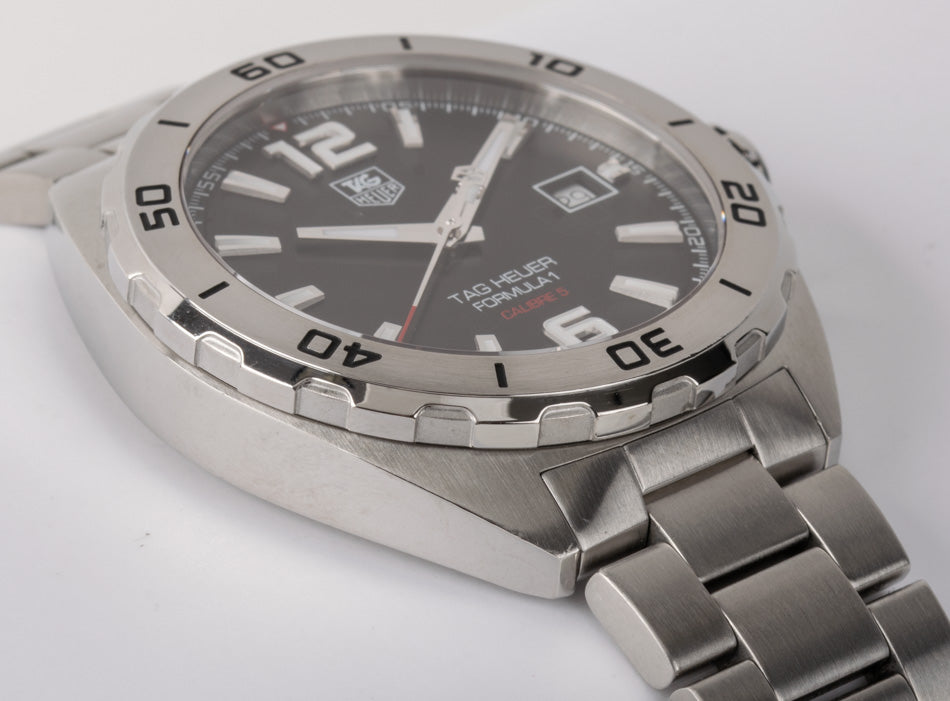 Shop Authentic Tag Heuer Formula 1 Automatic Black Dial Silver Steel Strap Watch for Men - WAZ2113.BA0875 - Luxxuri