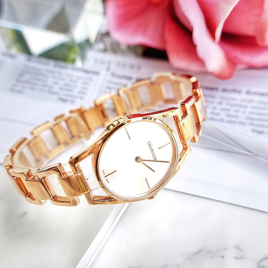 Shop Authentic Calvin Klein Snake Silver Dial Rose Gold Steel Strap Watch For Women - K6E23646 - Luxxuri