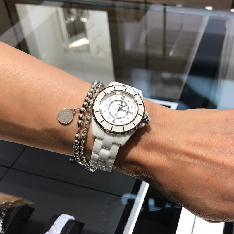  Shop Authentic Chanel J12 Diamonds Quartz Ceramic White Dial White Steel Strap Watch for Women - J12 H2422 - Luxxuri